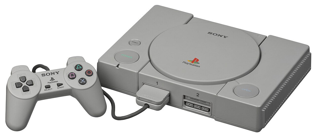 An original Sony PlayStation SCPH-1000 with its controller and memory card